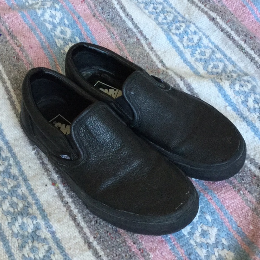 Vans all black leather slip ons